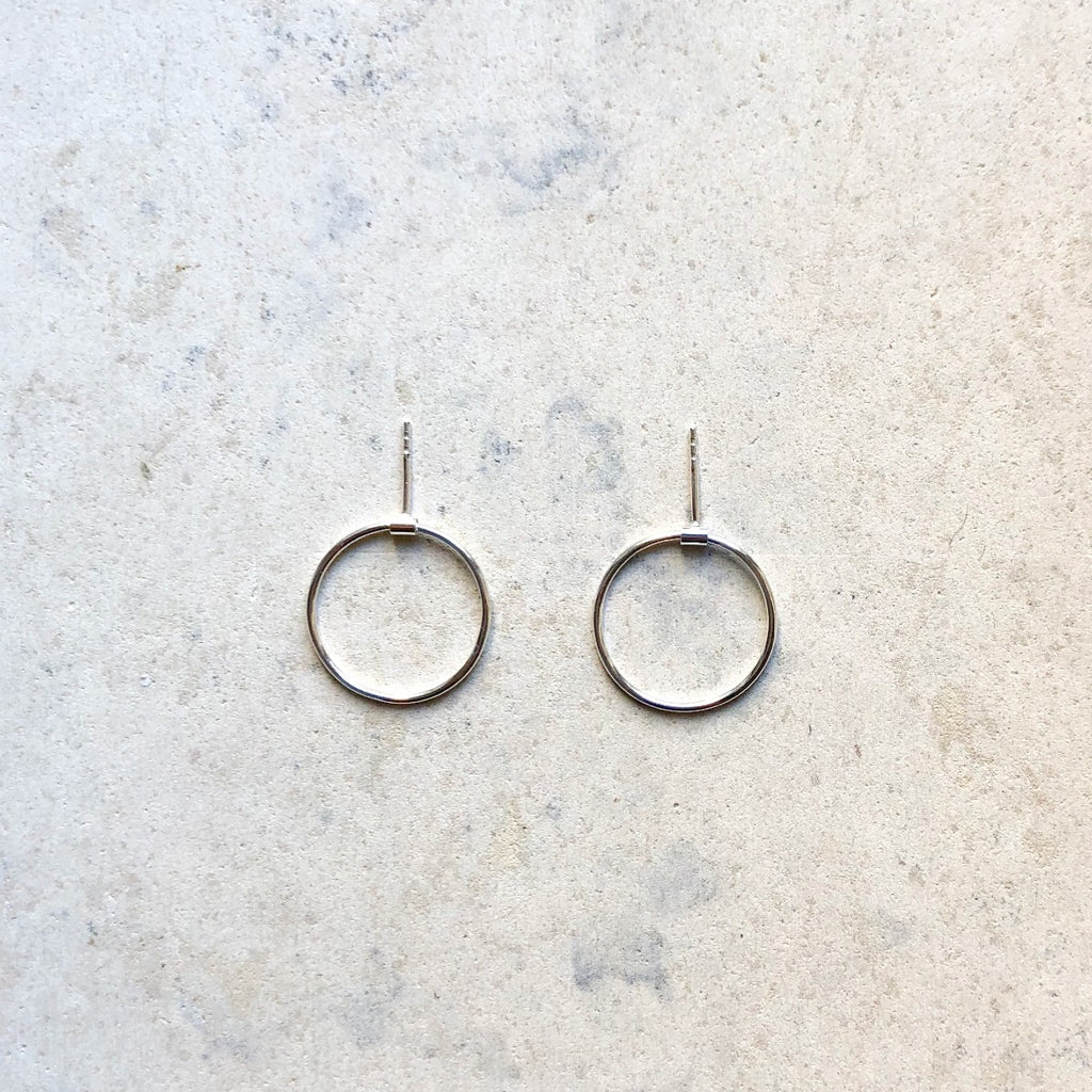 Playful silver hoops