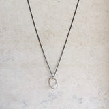 ''Daydreaming'' lightweight chain with hand shaped sphere